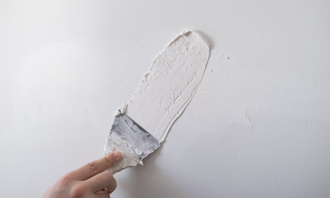 fixing wall by skim coating