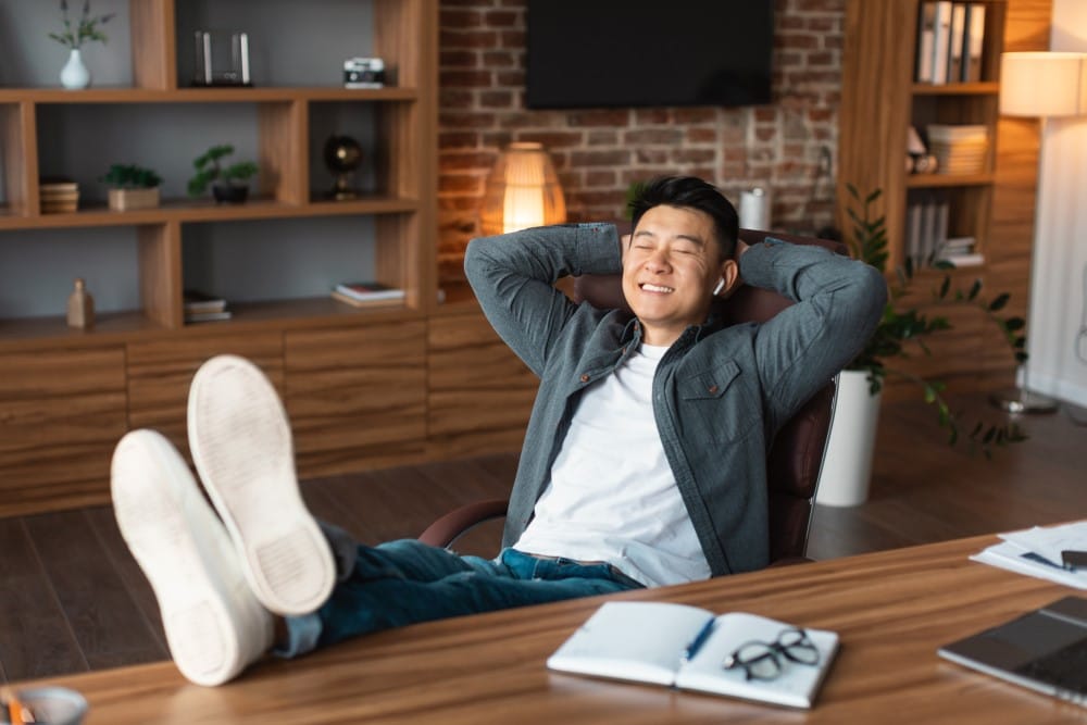 businessman enjoying his clean office desk