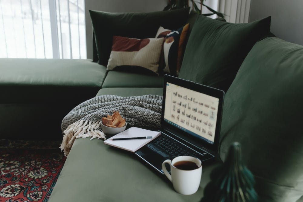 buying second hand furniture online using on a laptop