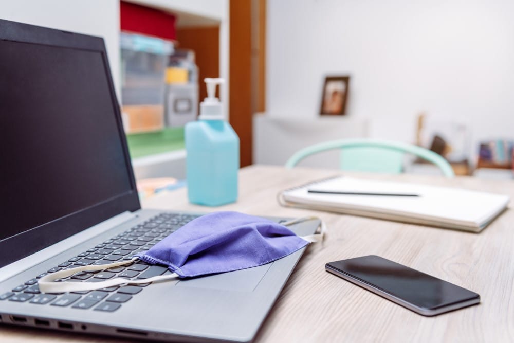 mask and alcohol for unseen germs in your office desk