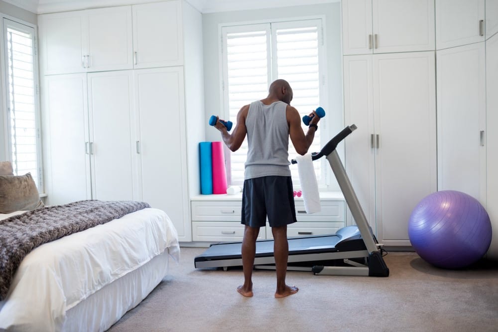 gym equipment inside bedroom