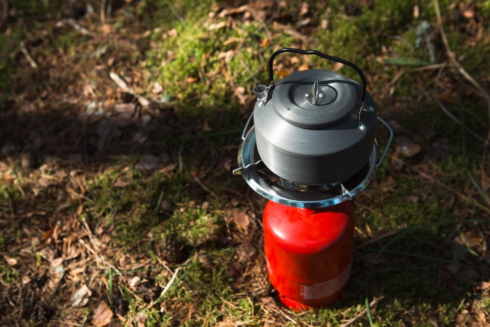 cooking outdoor using a portable gas stove
