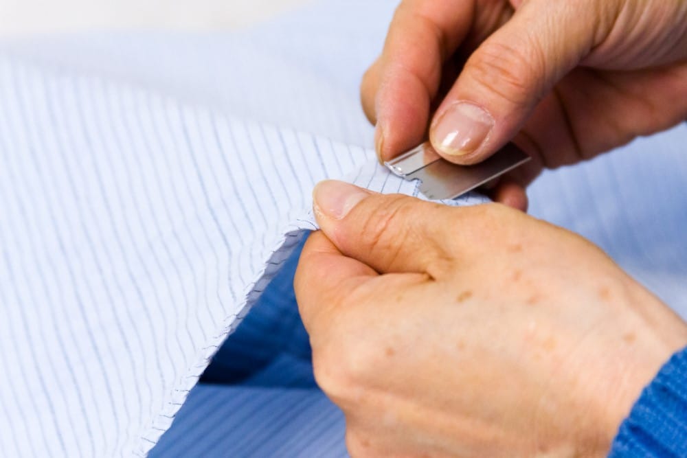 removing sticker residue using blade