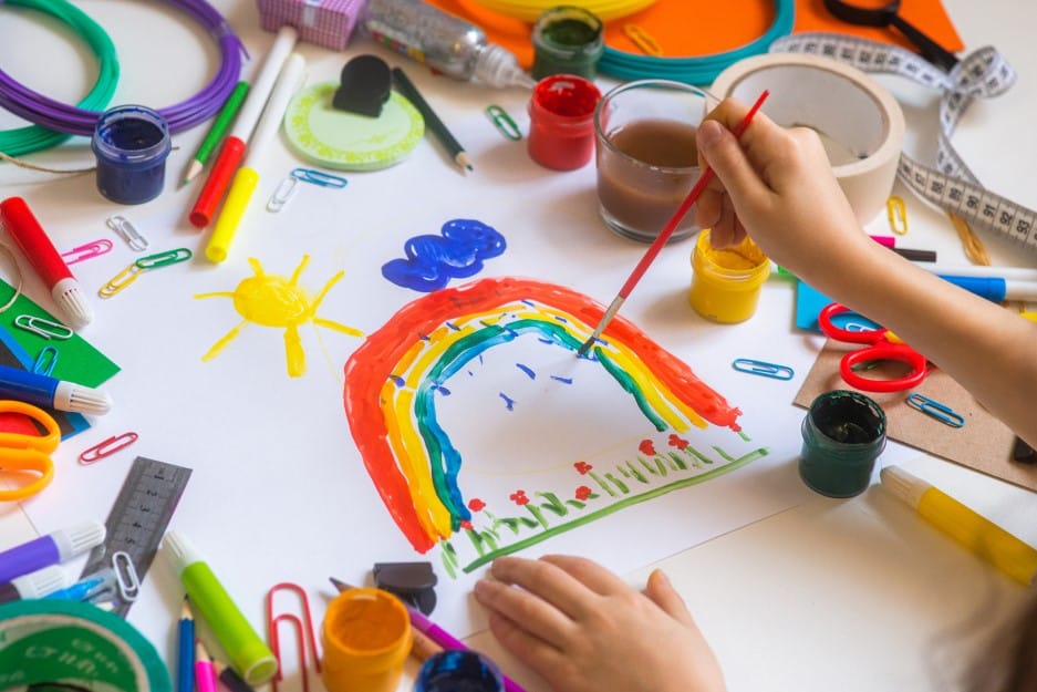 kid working with art project