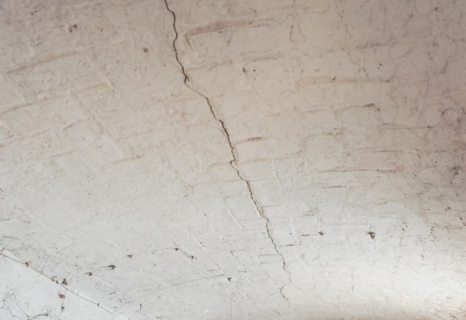 concrete ceiling with cracks