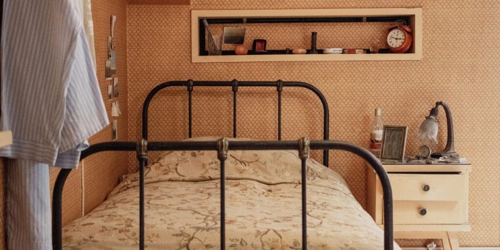 A single bed pushed into a tight corner, a common bedroom design layout mistake