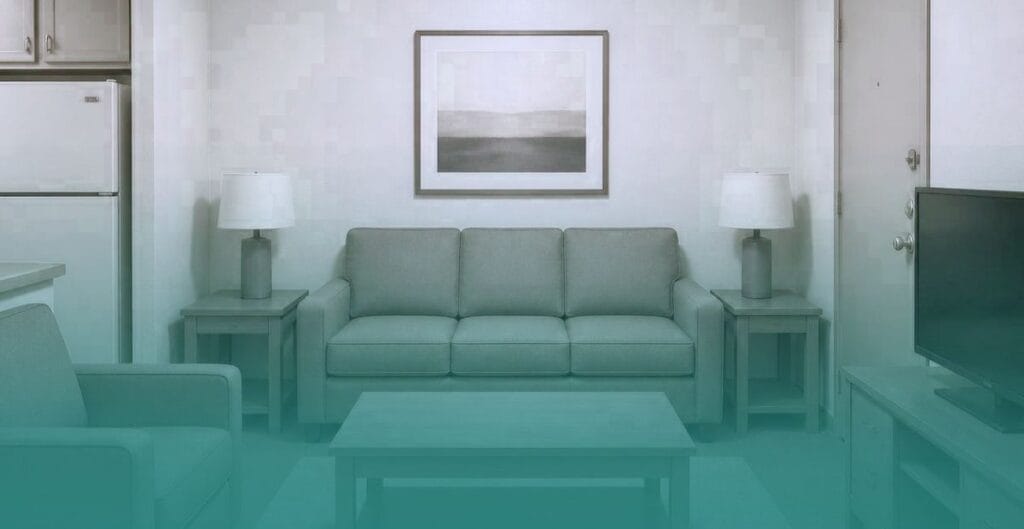Living room layout with furniture pushed against the walls.